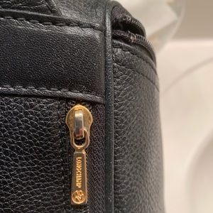 Vintage Longchamp black pebbled leather backpack purse.